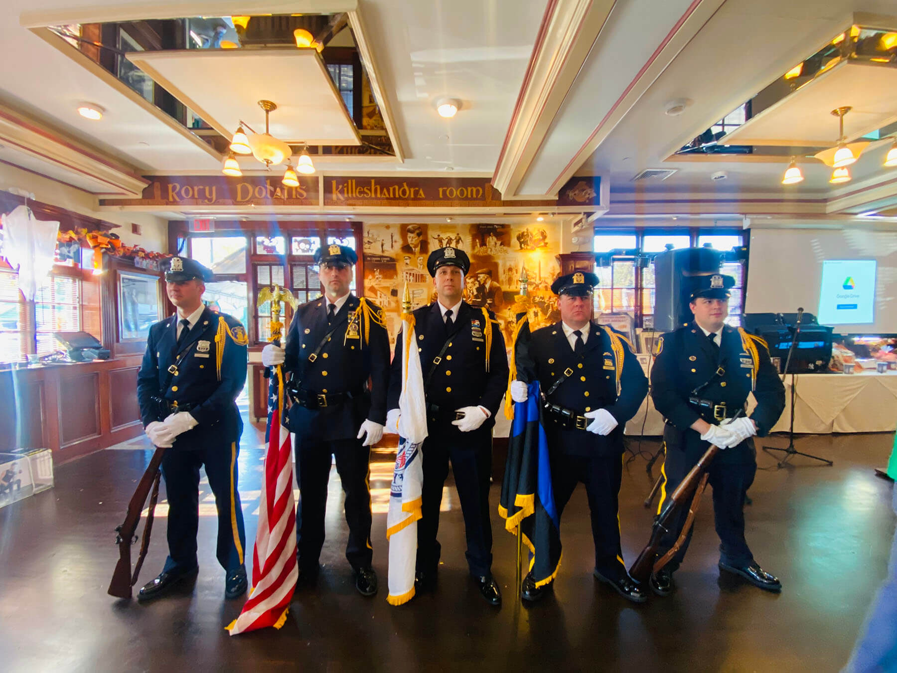 waiter and waitress holding drinks