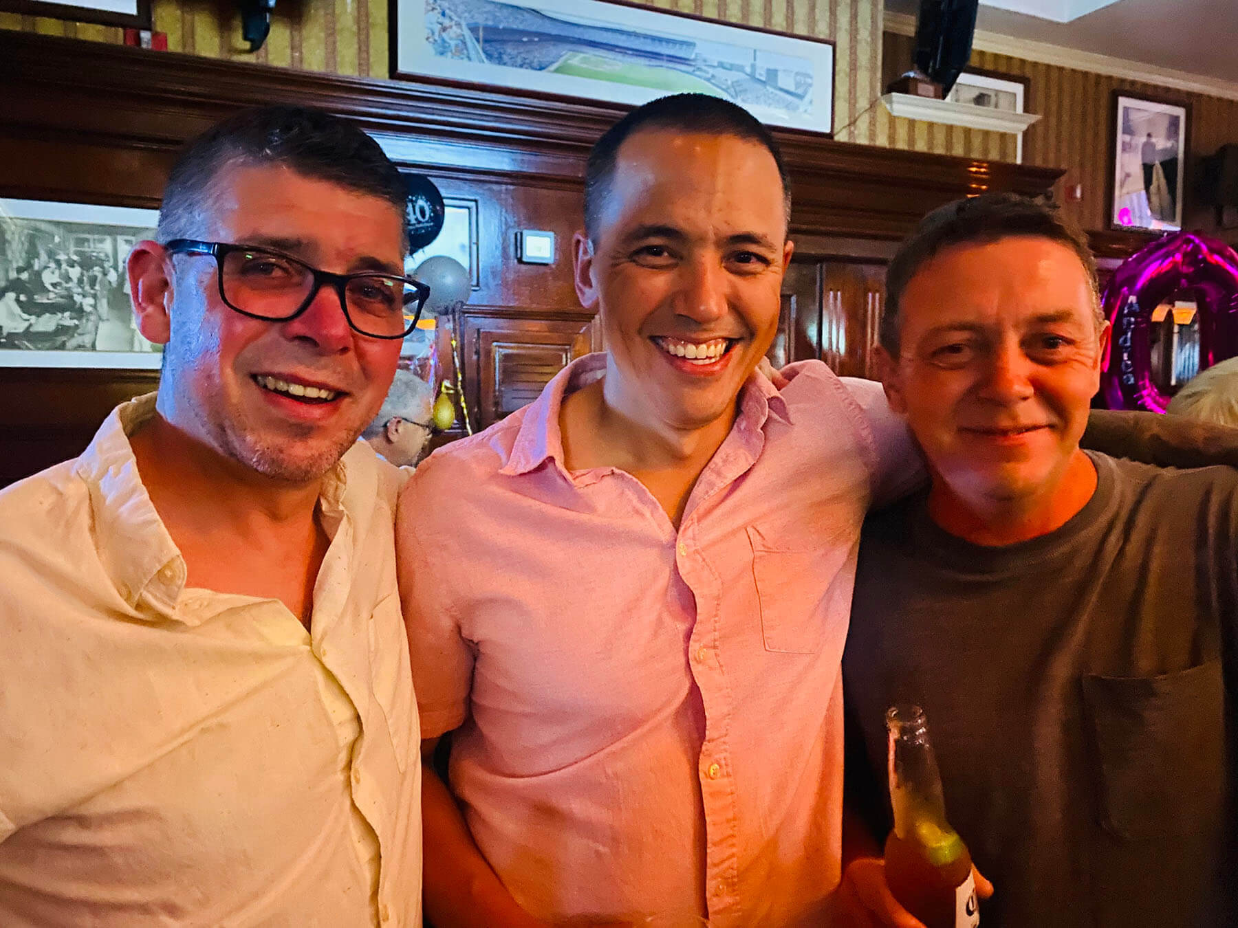 waiter and waitress holding drinks