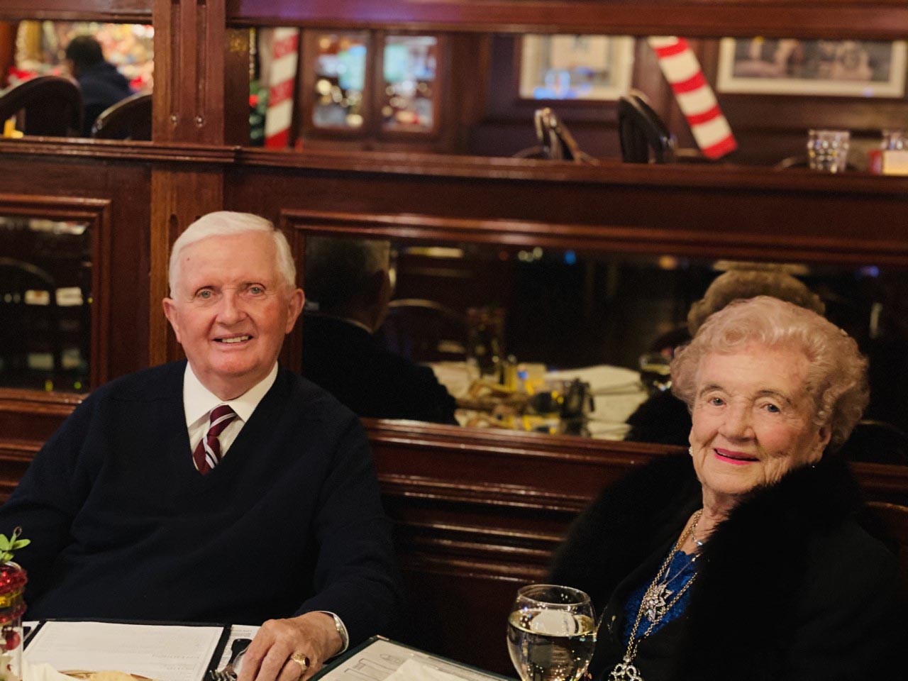 older man and woman dining
