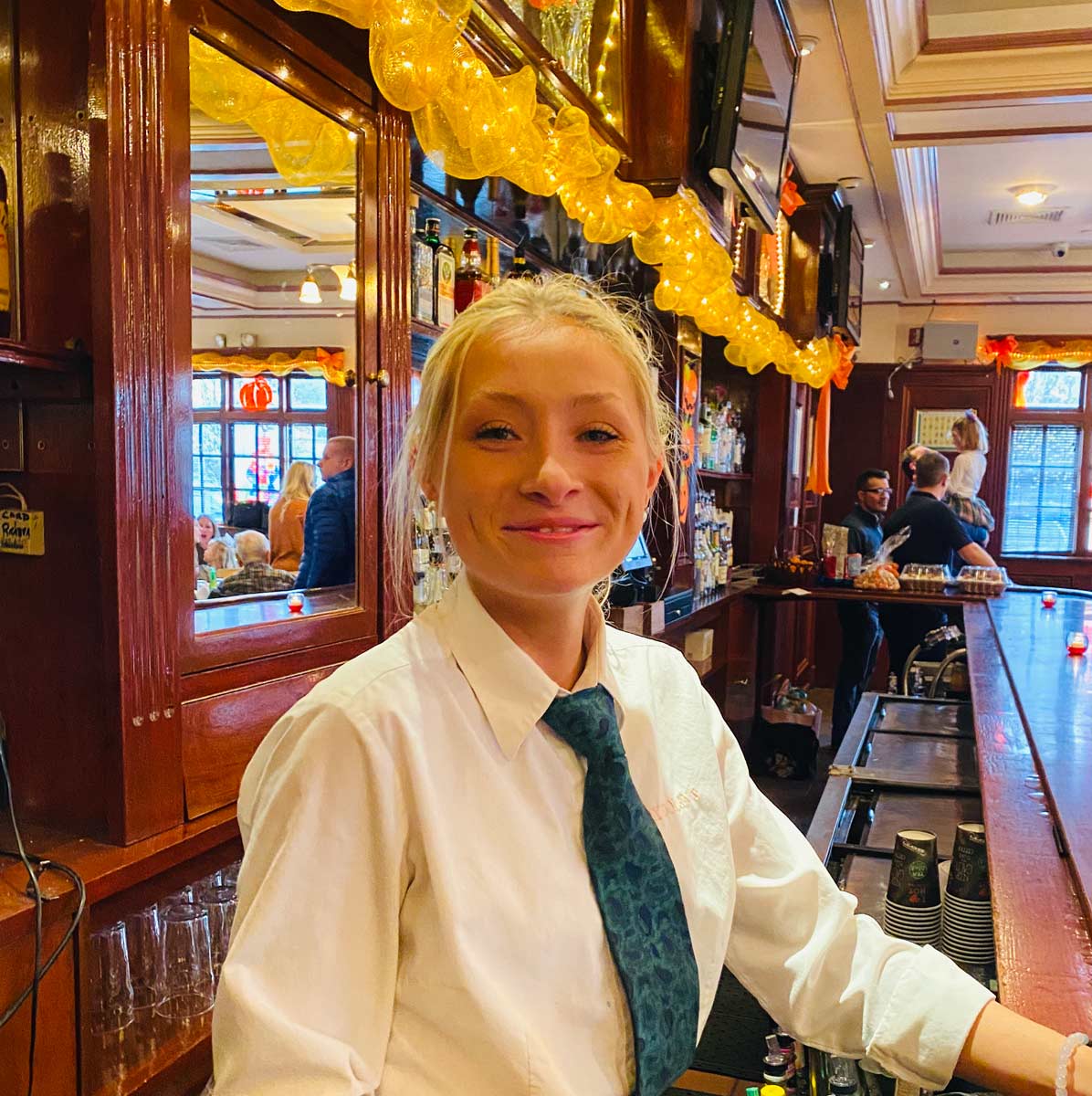 waitress behind the bar