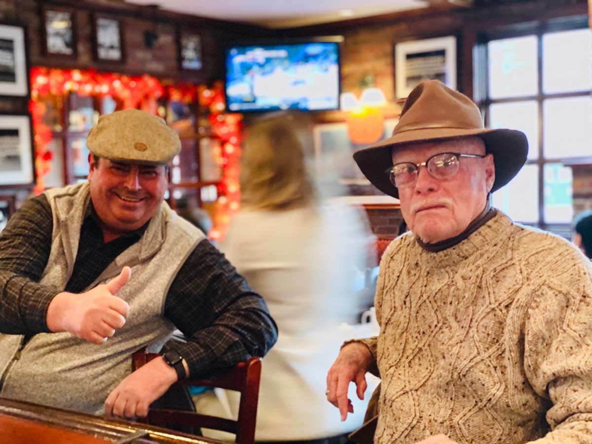 two patrons at the bar