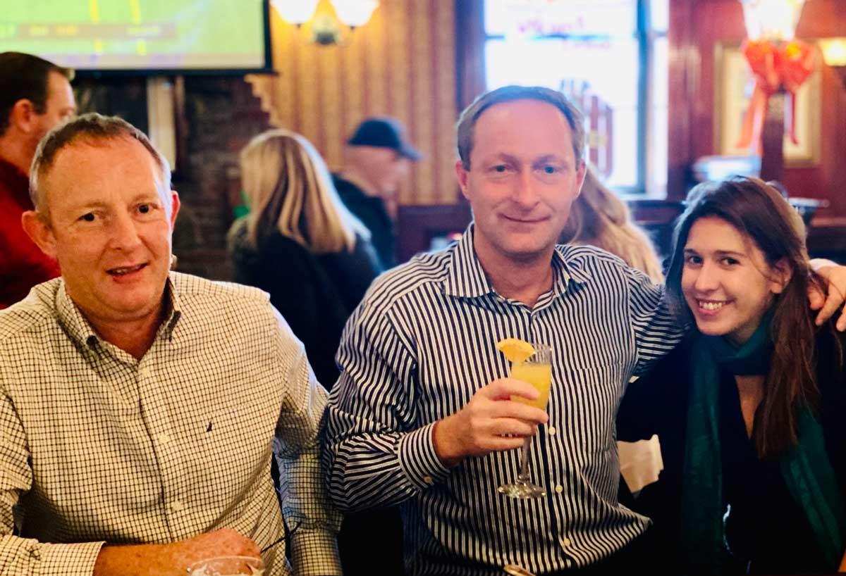 photo of patrons with drinks